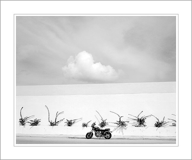 Motorcycle and Cloud